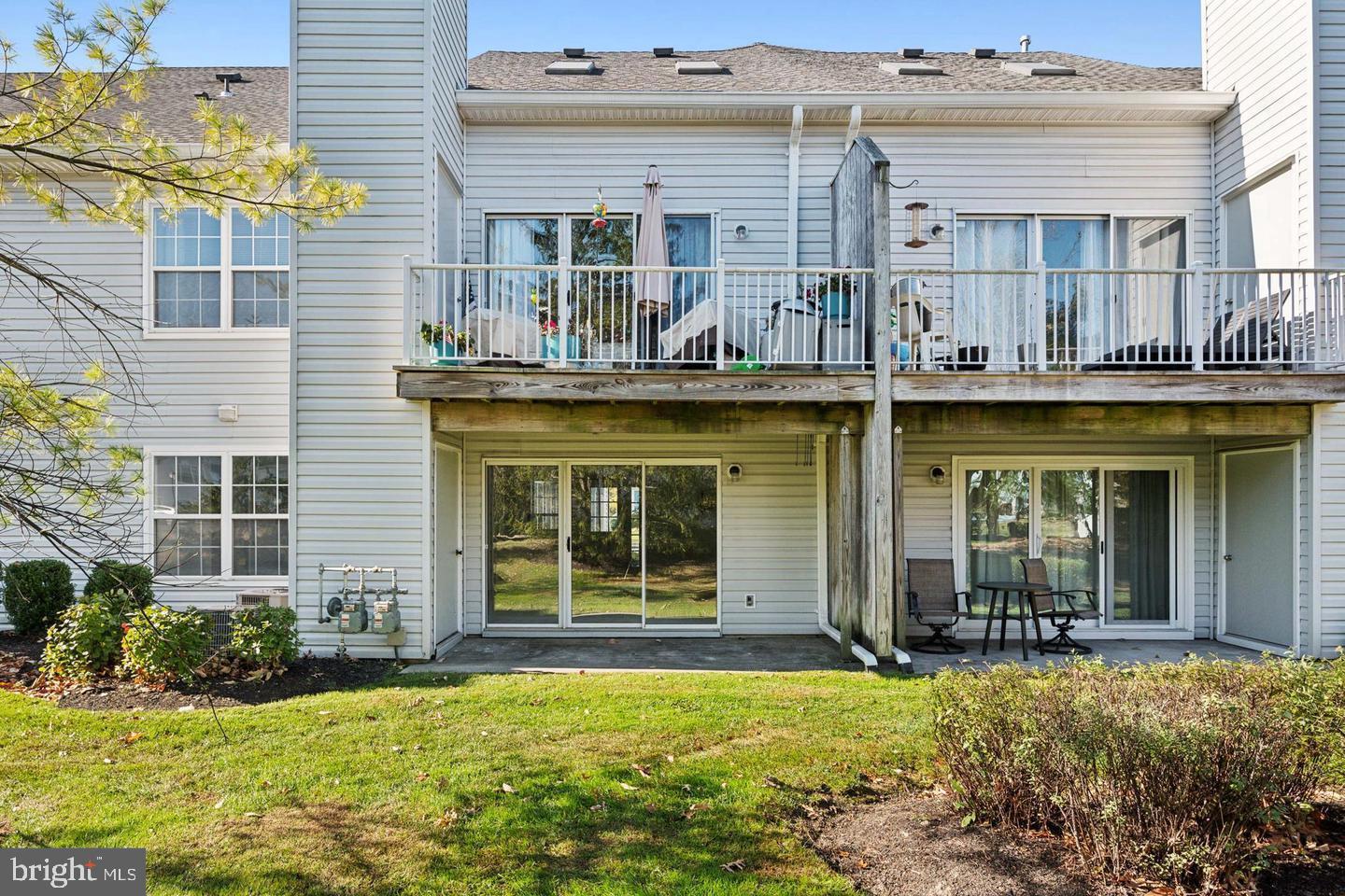 1107 Squirrel Road Marlton, NJ 08053 - Photo 24 of 24 front view of a building with a swimming pool