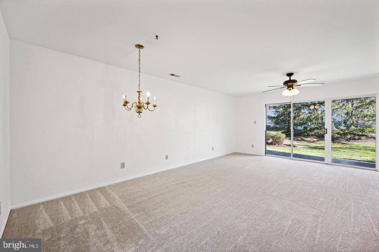 1107 Squirrel Road Marlton, NJ 08053 - Photo 5 of 24 a view of an empty room with a window