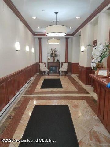 155 Bay Street, Unit 4F Staten Island, NY 10301 - Photo 2 of 6 a view of a lobby with table and chairs