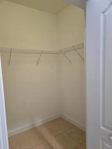 a view of a room with racks on the wall