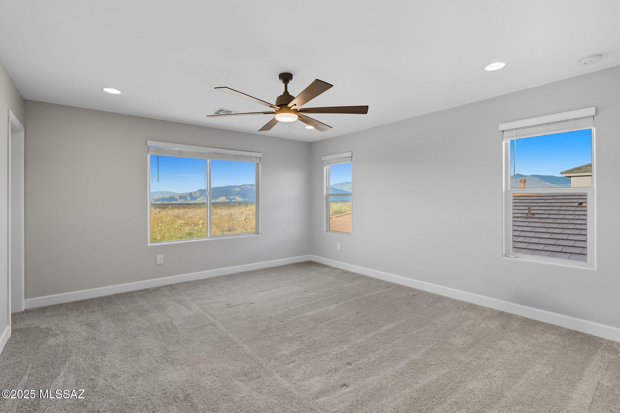 12100 East Ryscott Circle Vail, AZ 85641 - Photo 25 of 53 a view of an empty room with a window