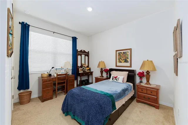 a bedroom with a bed and furniture