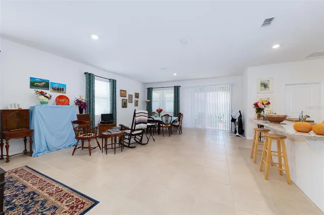 a kitchen with a refrigerator stove and sink