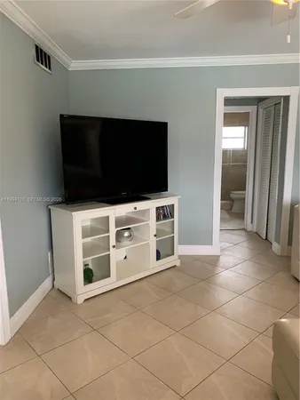a view of a livingroom with furniture