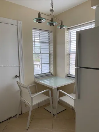 a room with table and window