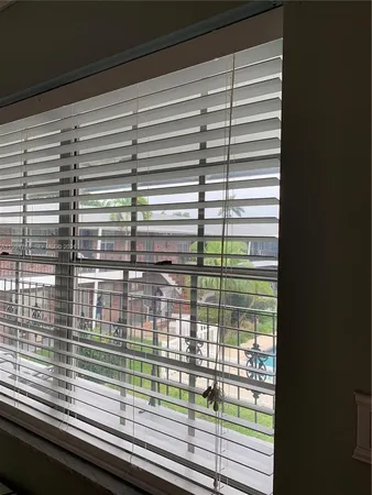 a view of a balcony and window