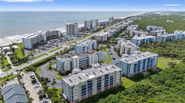 a view of a city with an ocean