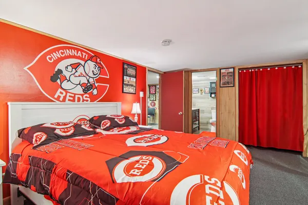 a bedroom with a bed and a closet