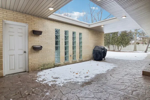 a view of a backyard of the house