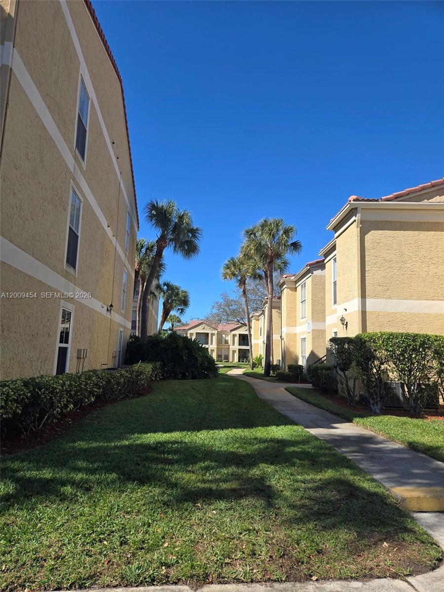 733 Riverside Drive, Unit 1210 Coral Springs, FL 33071 - Photo 17 of 22 Walking Path