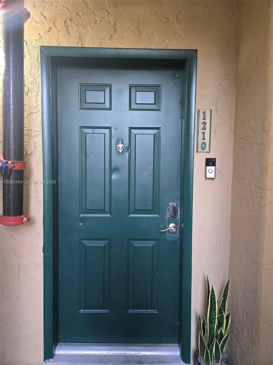 733 Riverside Drive, Unit 1210 Coral Springs, FL 33071 - Photo 4 of 22 Entrance Door