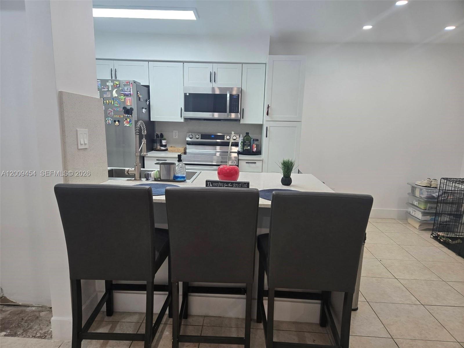 733 Riverside Drive, Unit 1210 Coral Springs, FL 33071 - Photo 6 of 22 Eating bar stools