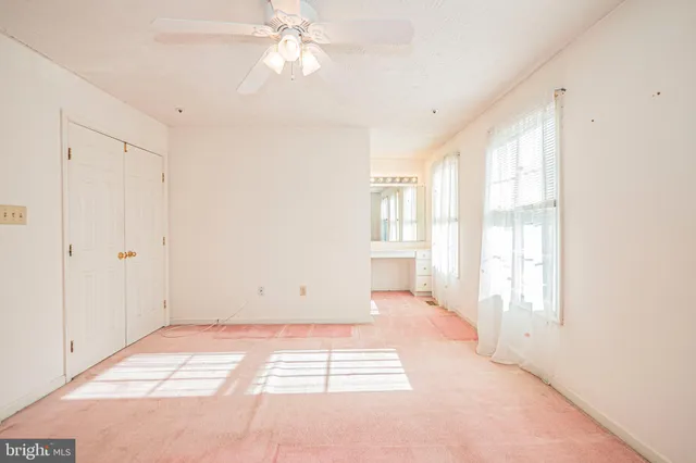 a view of a room with a large window
