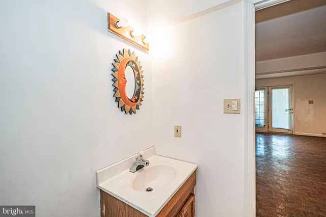 a view of a house with a sink and refrigerator