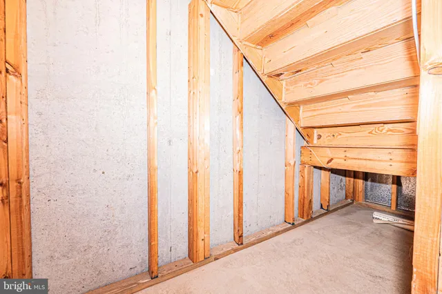 a view of a house with wooden deck