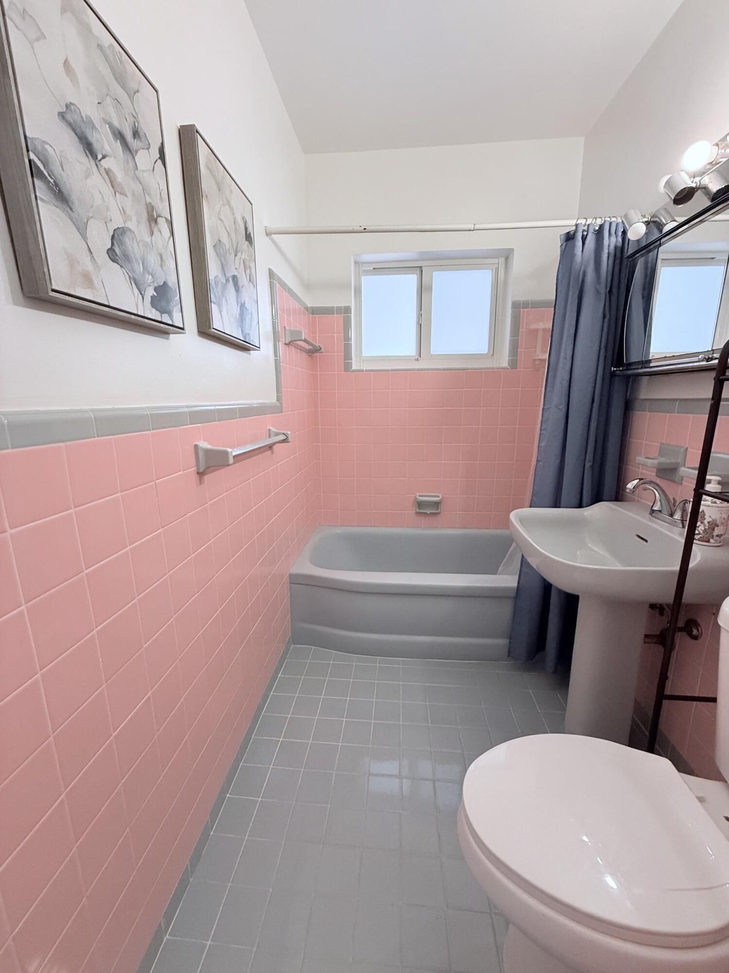 957 West 67th Street Hialeah, FL 33012 - Photo 14 of 15 a bathroom with a toilet a sink and bathtub
