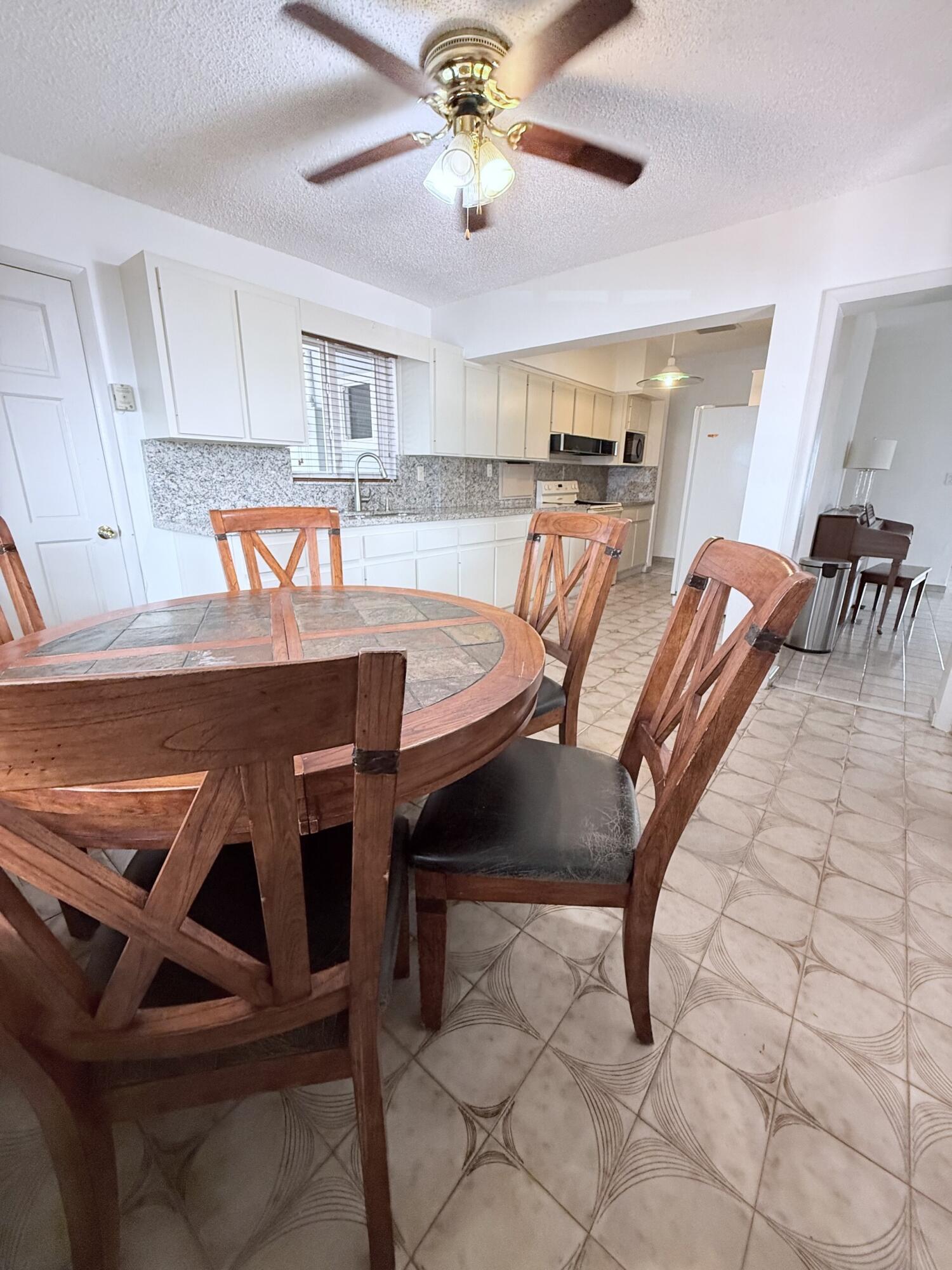 957 West 67th Street Hialeah, FL 33012 - Photo 8 of 15 a view of kitchen with cabinets