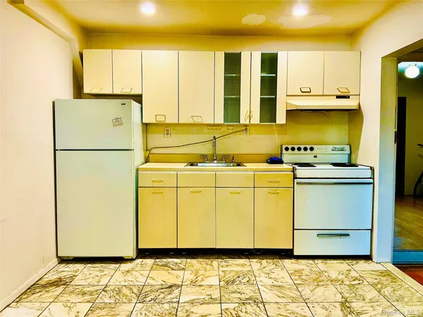 a utility room with washer and dryer
