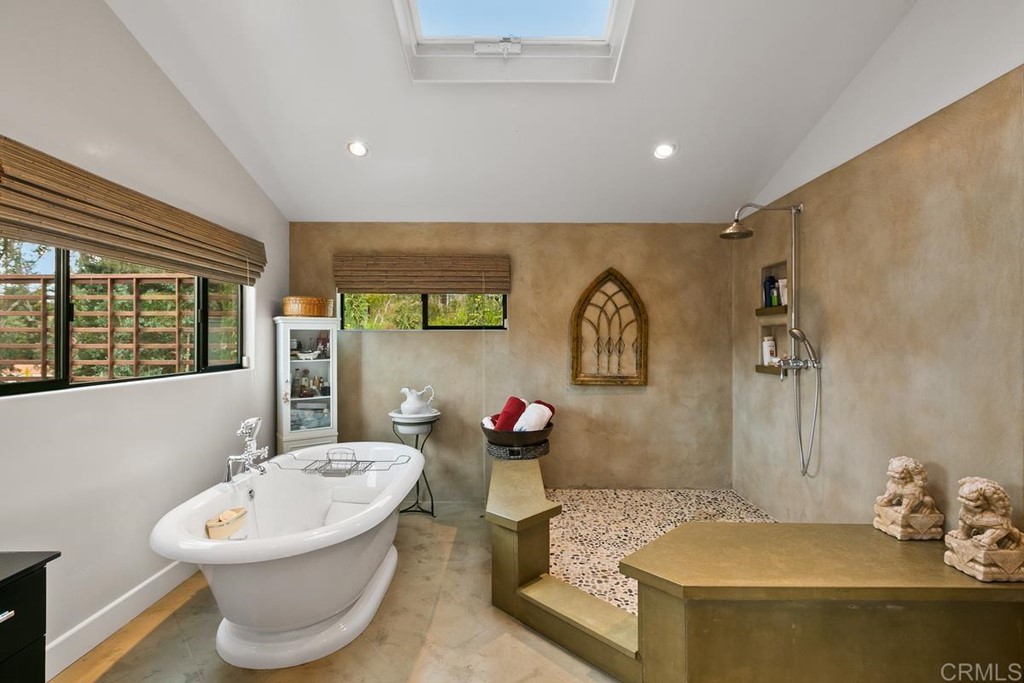 230 Winterhawk Lane Encinitas, CA 92024 - Photo 15 of 28 a bathroom with a sink and a mirror