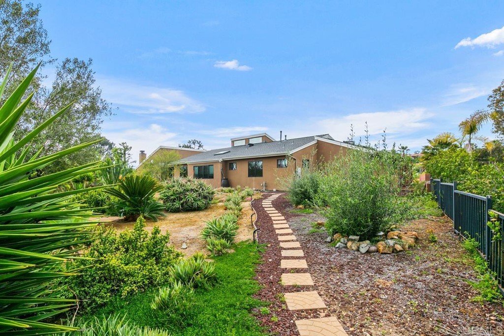 230 Winterhawk Lane Encinitas, CA 92024 - Photo 28 of 28 a front view of a house with a yard
