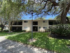 6004 Laketree Lane, Unit D Temple Terrace, FL 33617 - Photo 1 of 1 a front view of house with yard and green space