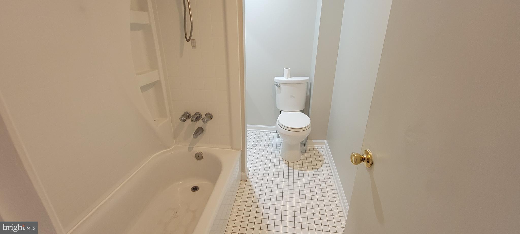 2643 Emerald Street Philadelphia, PA 19125 - Photo 12 of 14 a bathroom with a toilet and a shower