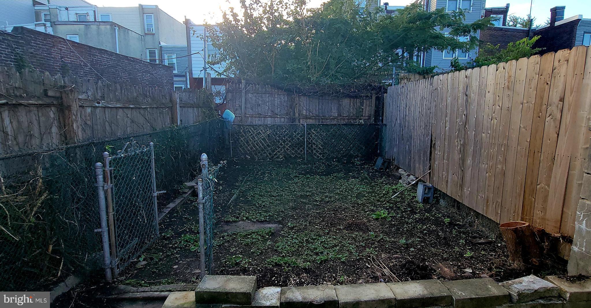 2643 Emerald Street Philadelphia, PA 19125 - Photo 3 of 14 a view of a backyard with plants