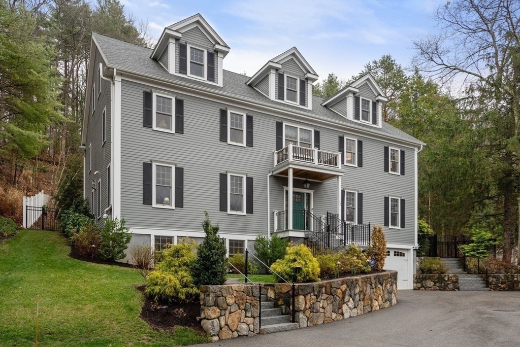 front view of a house with a yard