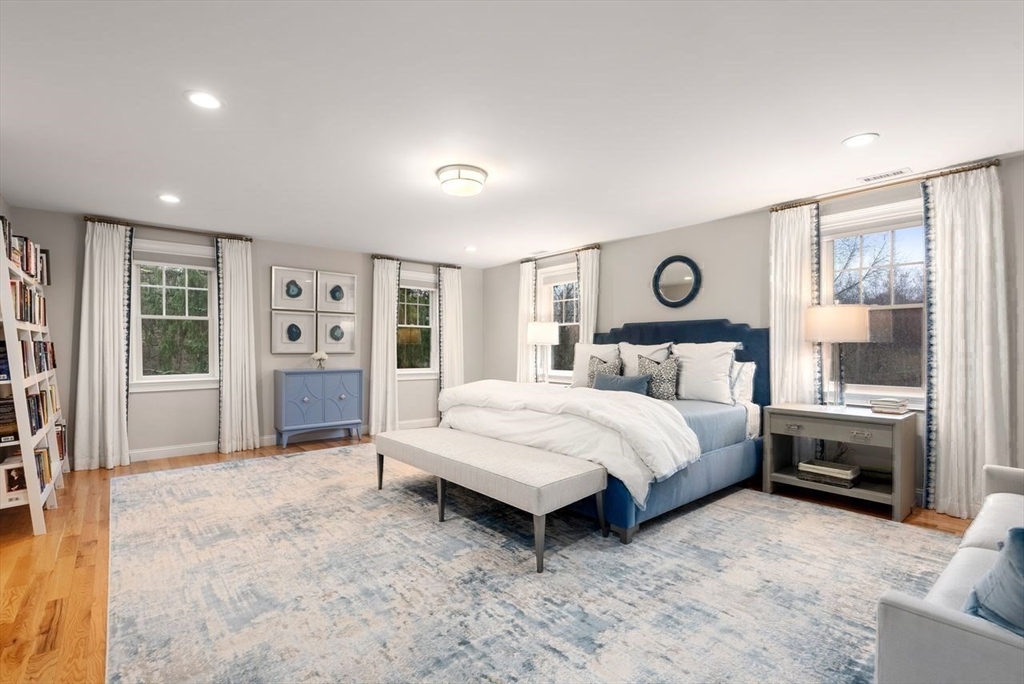 72 Great Plain Avenue Wellesley, MA 02482 - Photo 18 of 38 a bedroom with a bed and a cabinets