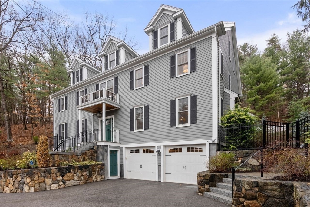 72 Great Plain Avenue Wellesley, MA 02482 - Photo 2 of 38 a front view of a house with parking