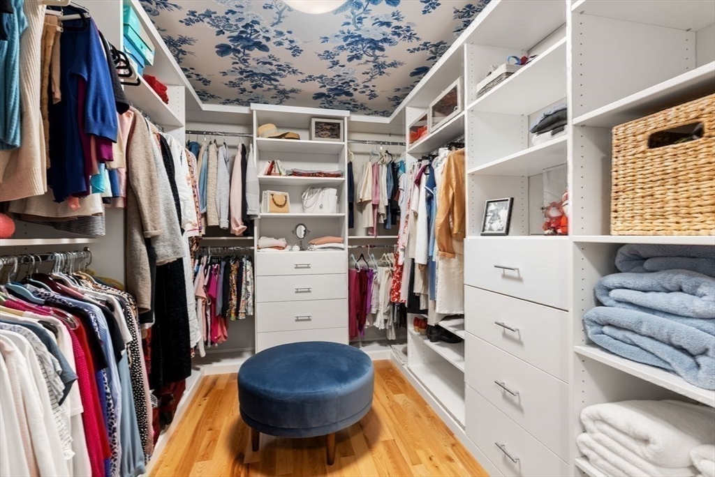 72 Great Plain Avenue Wellesley, MA 02482 - Photo 21 of 38 a view of walk in closet with clothes and shoes
