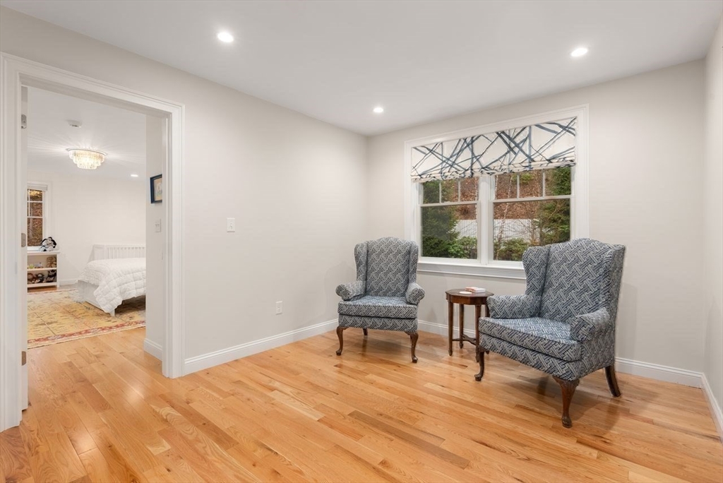 72 Great Plain Avenue Wellesley, MA 02482 - Photo 25 of 38 a living room with furniture and a large window
