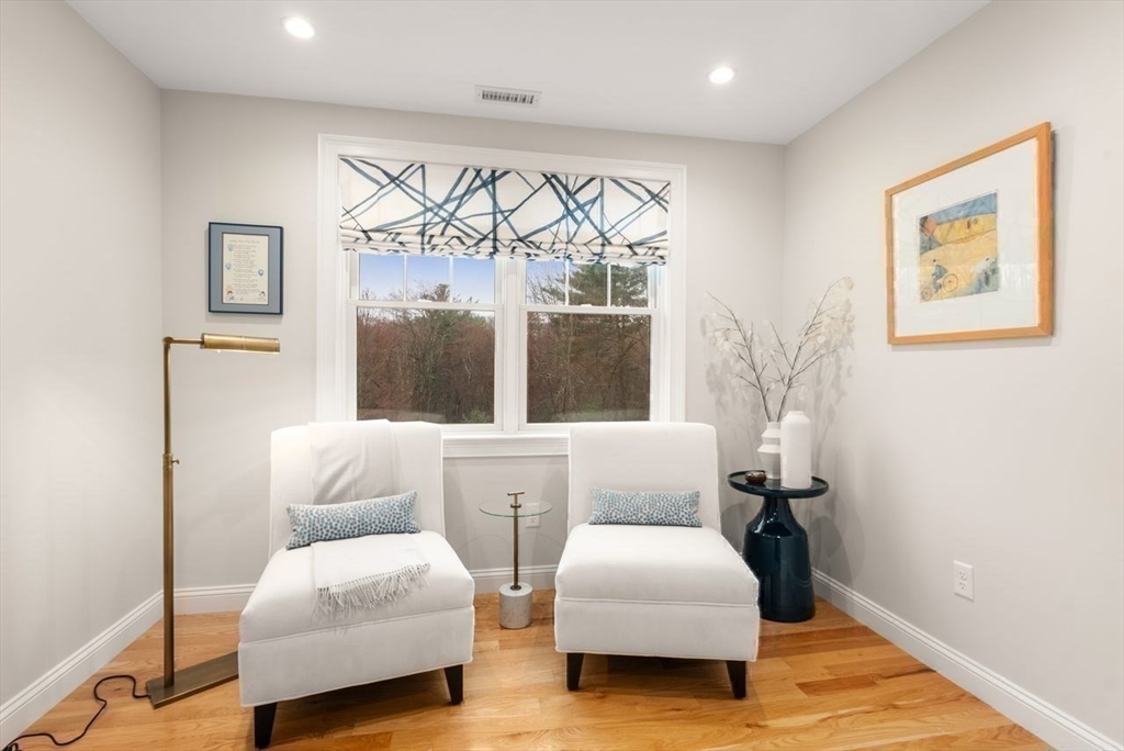 72 Great Plain Avenue Wellesley, MA 02482 - Photo 29 of 38 a living room with furniture and a large window