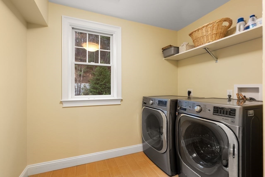 72 Great Plain Avenue Wellesley, MA 02482 - Photo 30 of 38 a utility room with dryer and washer
