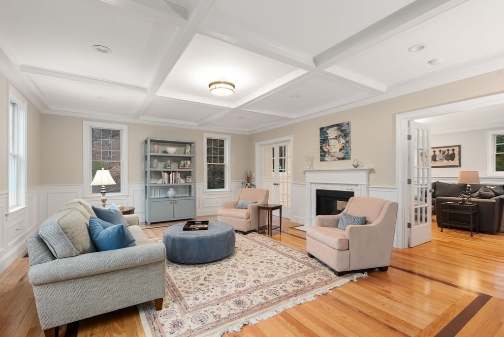 72 Great Plain Avenue Wellesley, MA 02482 - Photo 6 of 38 a living room with furniture a rug and a fireplace