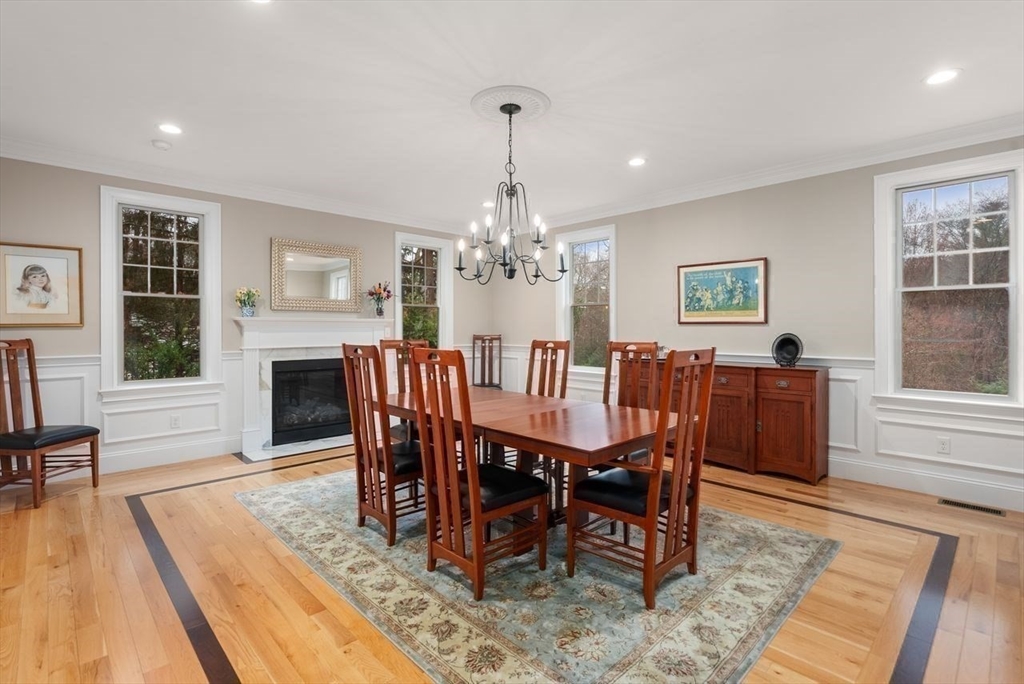 72 Great Plain Avenue Wellesley, MA 02482 - Photo 9 of 38 a view of a dining room with furniture window and wooden floor