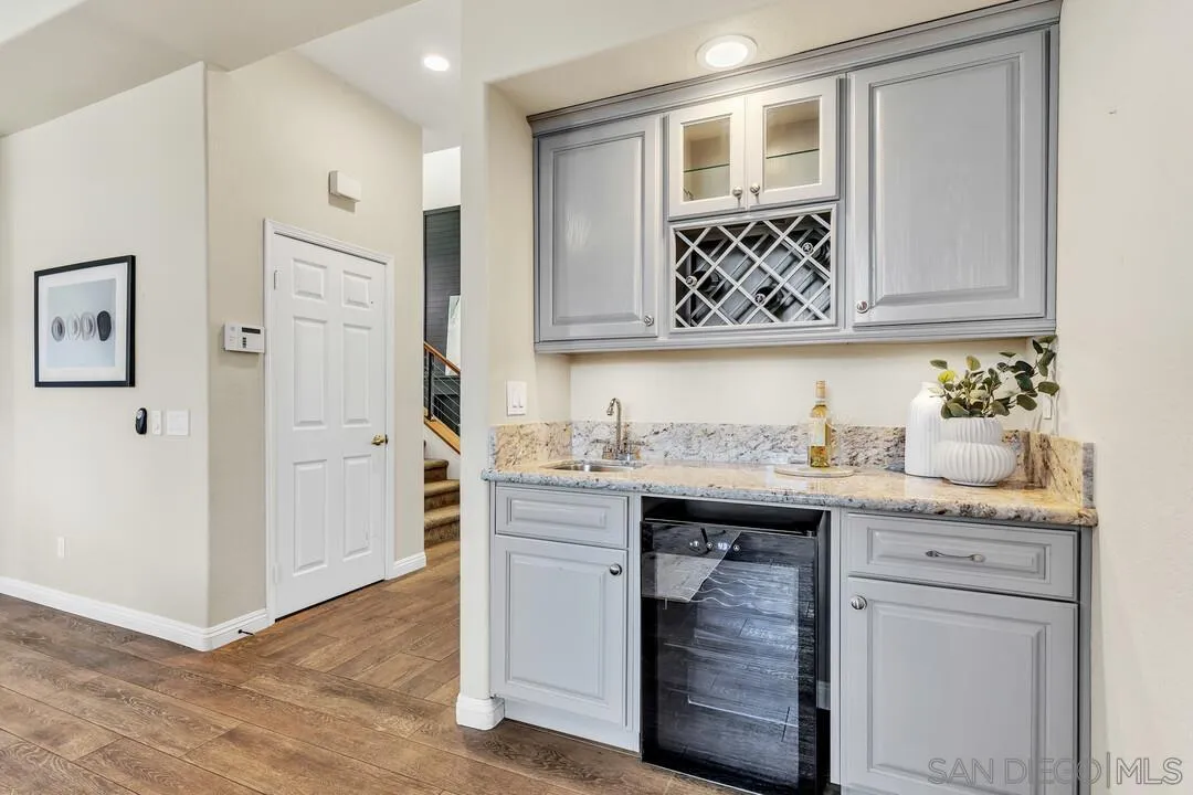 1198 Hanover Place Alpine, CA 91901 - Photo 16 of 68 a bathroom with a granite countertop sink and a mirror