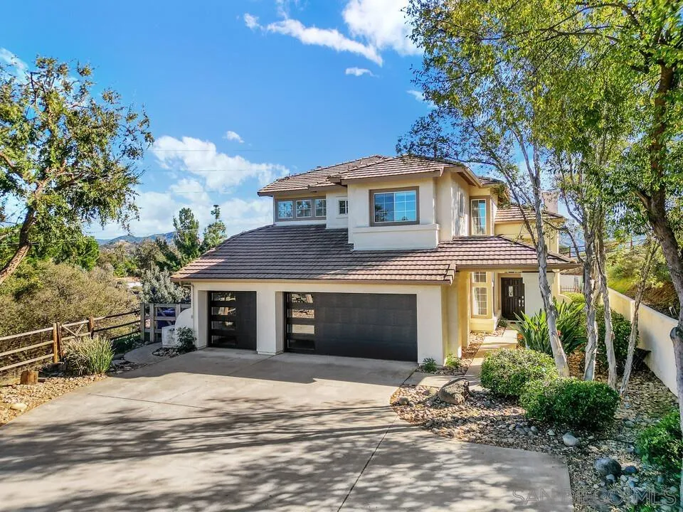 1198 Hanover Place Alpine, CA 91901 - Photo 2 of 68 a front view of a house with a garden