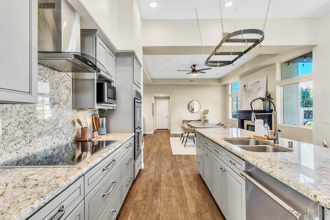 1198 Hanover Place Alpine, CA 91901 - Photo 24 of 68 a large kitchen with stainless steel appliances granite countertop a lot of counter space