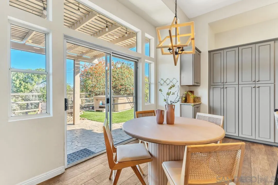 1198 Hanover Place Alpine, CA 91901 - Photo 27 of 68 a view of a dining room with furniture window and wooden floor