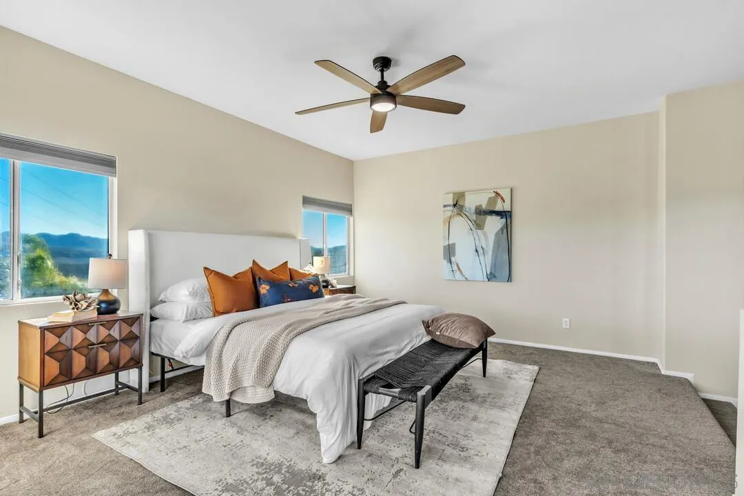 1198 Hanover Place Alpine, CA 91901 - Photo 40 of 68 a bedroom with a bed and a chandelier