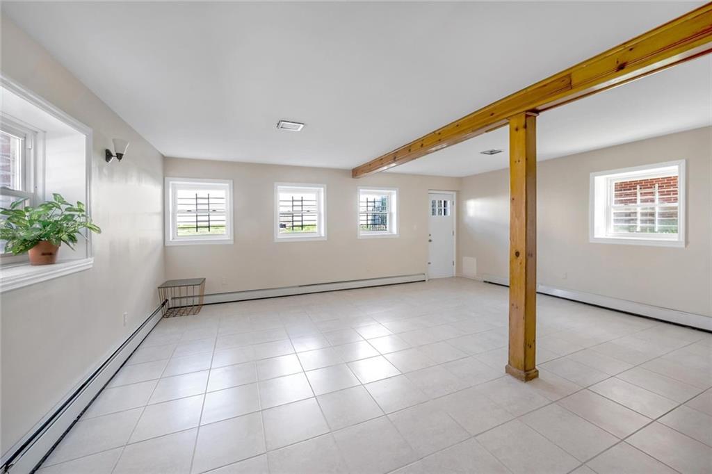 187 Irwin Street Brooklyn, NY 11235 - Photo 4 of 12 a view of an empty room with a window