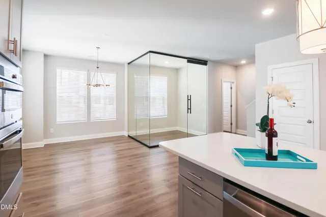 a bathroom with a sink and a large mirror