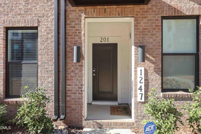 a view of front door of house and an entrance
