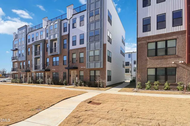 a view of a building with a street