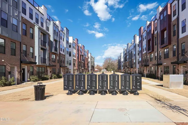 a street view with tall buildings