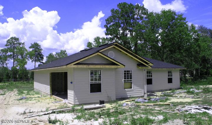 6255 Payne Road Keystone Heights, FL 32656 - Photo 3 of 3 front view of house with a yard