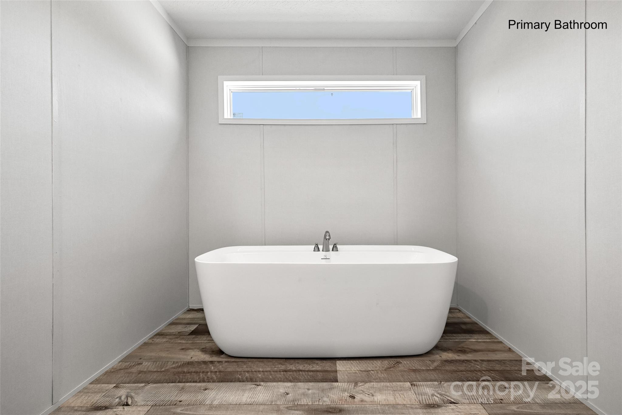 596 Jack Bone Hill Road Jefferson, SC 29718 - Photo 12 of 27 a white bath tub sitting in a bathroom