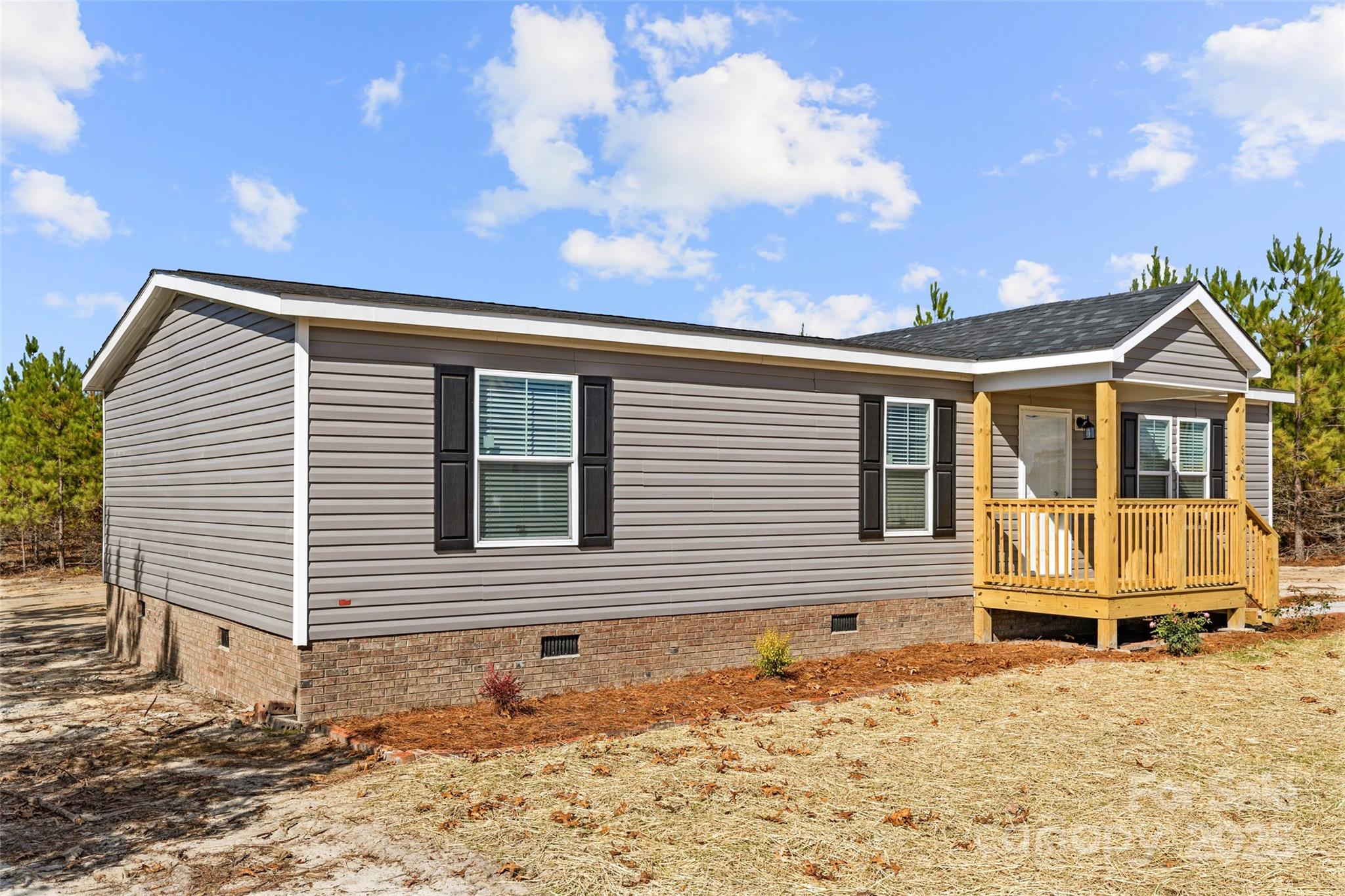 596 Jack Bone Hill Road Jefferson, SC 29718 - Photo 20 of 27 a view of a house with a yard