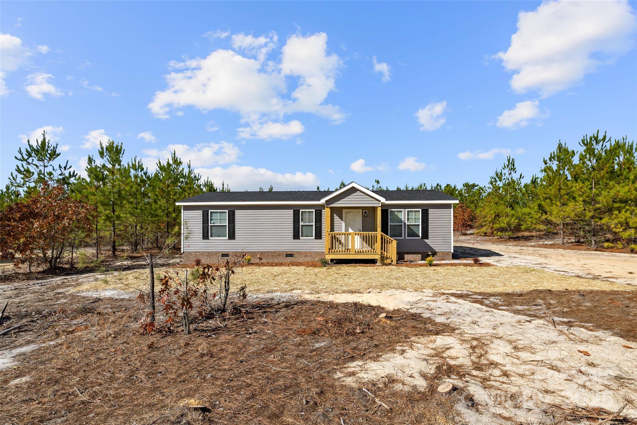 596 Jack Bone Hill Road Jefferson, SC 29718 - Photo 2 of 27 a view of a house with a yard